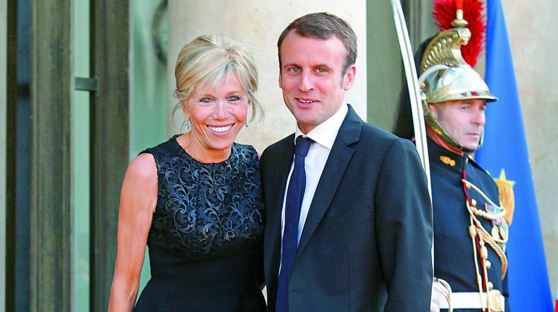 Brigitte Trogneux with husband Emmanuel Macron who could soon be Frances next President.