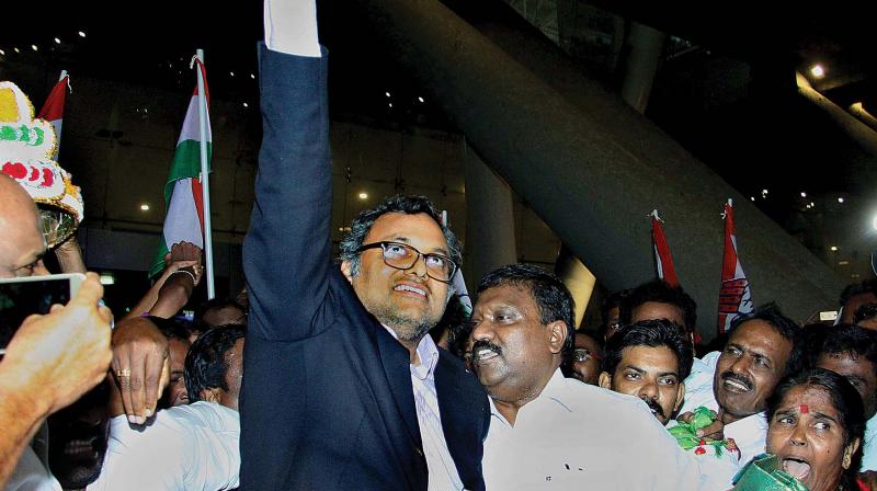 Karti Chidambaram greets his supporters upon arriving at Chennai Airport after getting bail in INX media case. (Photo: DC)