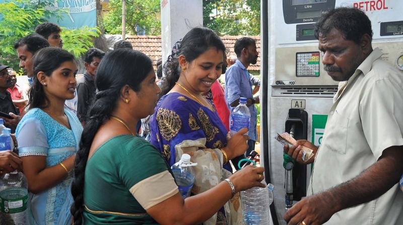 Rush at Supplyco fuel outlet at Pavamani Road in Kozhikode on Sunday (Photo: Viswajith K.  )