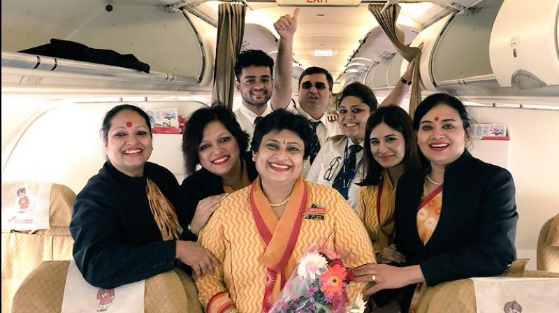 A photograph of Pooja Chinchankar on her last flight as an air hostess with Air India. (Photo: Twitter | @caramelwings)