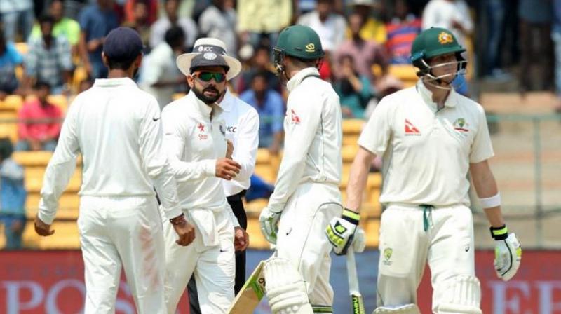 Virat Kohli immediately went over to protest, as Steve Smith turned towards the dressing room to ask help for a DRS referral. (Photo: BCCI)