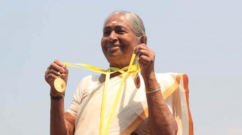 Savithiri Amma with the medals she got last year