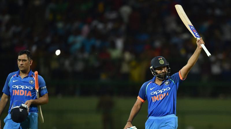 Rohit Sharma and MS Dhonis unbeaten 157-run partnership ensured victory for Team India in third ODI. (Photo: AP)
