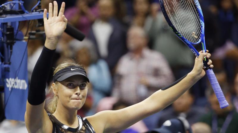 Sharapova acknowledges the crowd after beating American teenager Sofia Kenin. (Photo: AP)
