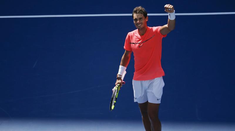 Nadal turned in his most powerful performance yet on a dominant day for the No. 1 seeds, and moved a victory away from the possible semifinal showdown with his longtime rival. (Photo: AP)