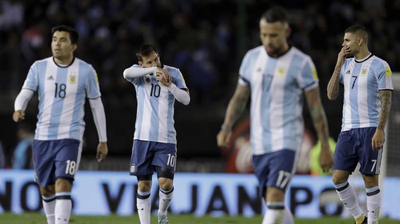 A second-half own goal from Venezuela defender Rolf Feltscher spared Argentinas blushes after the visitors had taken the lead through Jhon Murillo. (Photo: AP)