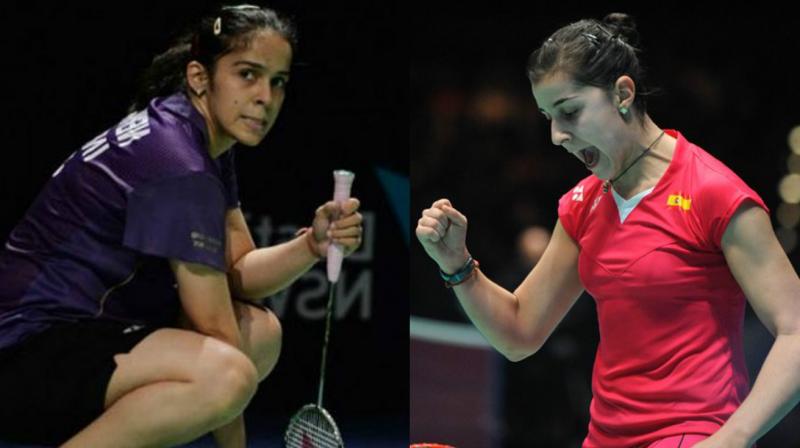 Marin cruised through to comfortable victory inspite of strong resistance from Saina. (Photo: AP/AFP)