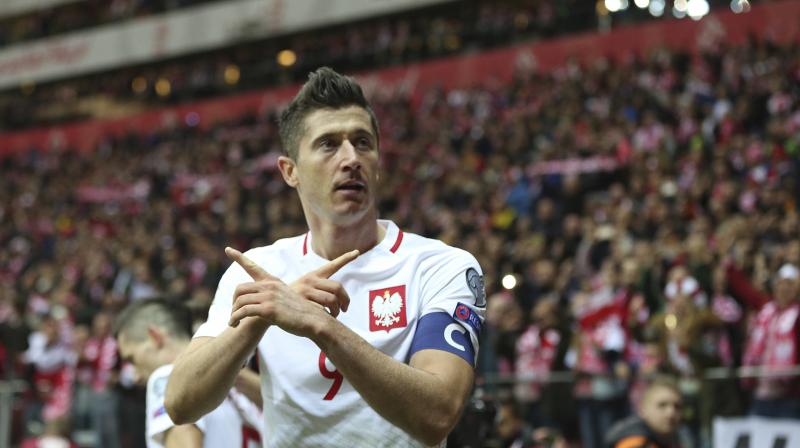 Lewandowski restored Polands advantage on 85 minutes before a late own goal from Filip Stojkovic sealed victory. (Photo: AP)