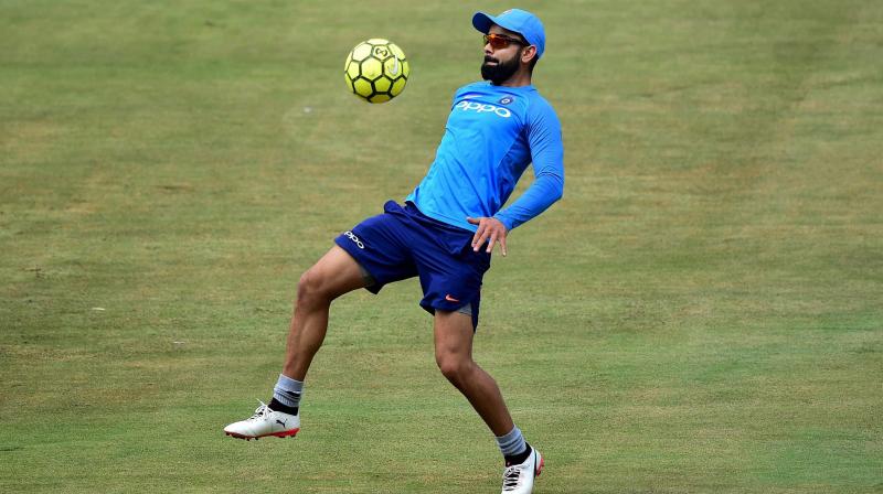 Kohli, who chatted with Jatin Sapru on a show on Star Sports, was asked about his football rating and which footballer he thinks he is while playing football. The Indian cricket team skipper uttered the name of Portuguese superstar Cristiano Ronaldo, who is his favourite player. (Photo:PTI)