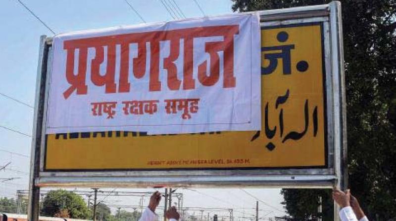 Protesters cover a nameplate of Allahabad with Prayagraj. (Photo: File)