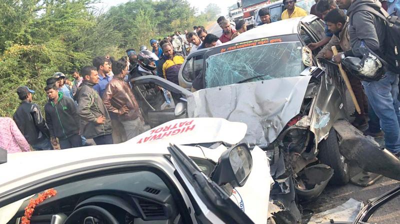 A vehicle from the convoy of Sri Vishwesha Theertha Swami damaged after colliding with another car