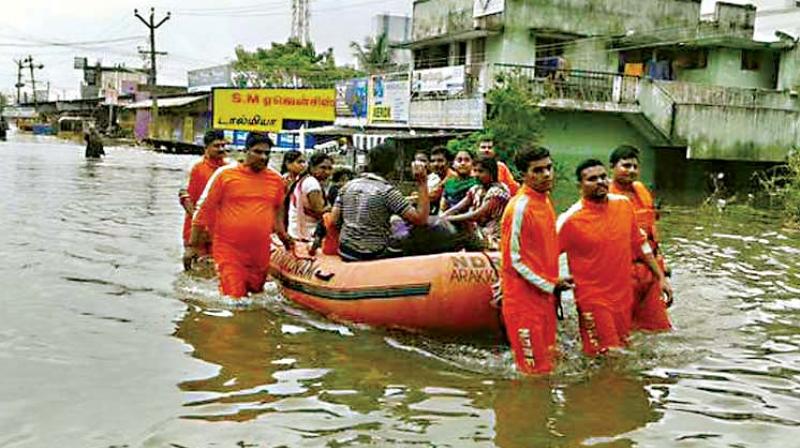 File photo of residents being ferried to safer places in Madivala