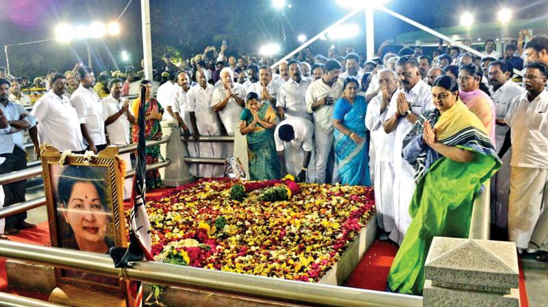 Caretaker Chief Minister O. Panneerselvam and J. Deepa, niece of J. Jayalalithaa at Jayalalaithaa memorial, on the Marina on Tuesday night. (Photo: DC)