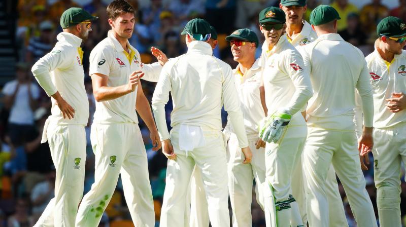 Australias Pat Cummins celebratest the wicket of Mark Stoneman during the first day of the first Ashes Test against England at Brisbane on Thursday. (Photo: AFP)