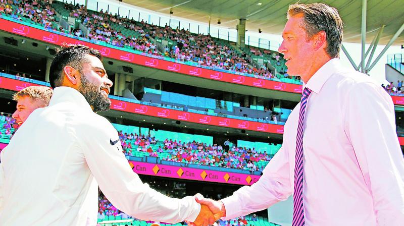 India captain Virat Kohli greets former Australian bowler Glenn McGrath. (Photo: AFP)