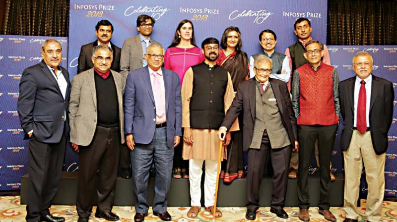 Top row left to right: S.K Satheesh, Sendhil Mullainathan, Nalini Anantharaman, Kavita Singh, Navakanta Bhat and Roop Mallik. Bottom row left to right: Pradeep K Khosla, Shrinivas Kulkarni, Drinivasa S.R. Varadhan, Manjul Bhargava, Amartya Sen, Abhijit Banerjee, Mriganka Sur.