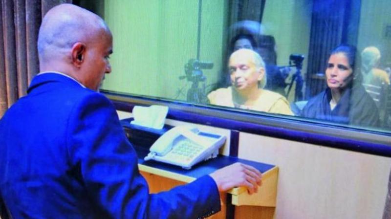 Jadhavs mother and wife had a restricted interaction with him for 40 minutes, separated  by a glass screen, in  Islamabad on Monday.  (Photo: File)