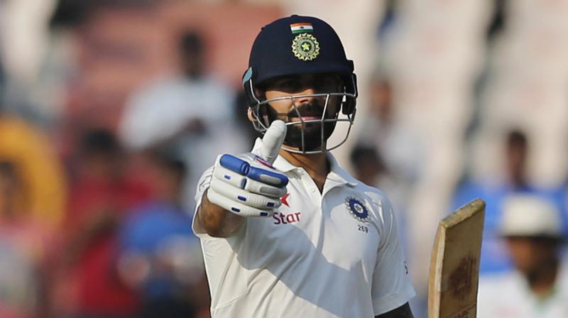 You watch him play and the one thing thats so impressive is that in Test cricket hes got all the shots and tricks but decides to get his head down and grind runs out, said Andrew Flintoff while praising Virat Kohli. (Photo: AP)
