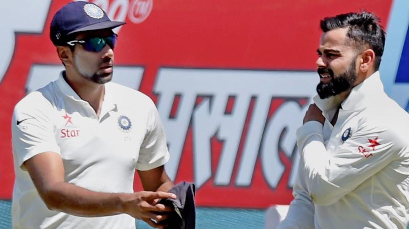 Virat Kohli could not field after landing awkwardly on his right shoulder while trying to save a boundary in the post-lunch session on day one of the third India-Australia Test in Ranchi. (Photo: PTI)