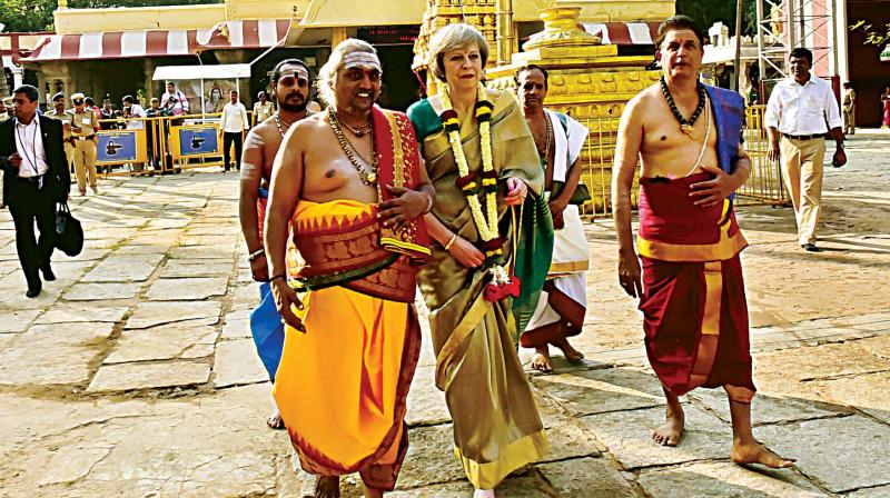 British PM Theresa May might have enjoyed her trip to Bengaluru which included a visit to the famed Someshwara Temple in Ulsoor but city residents bore the brunt forced to wait for hours together as she criss-crossed the city from one destination to the other. Vehicular movement on North and Central Bengaluru roads in the morning and afternoon was reduced to a snails pace eliciting acerbic comments that a heli-hop for the PM could have saved them a lot of trouble.