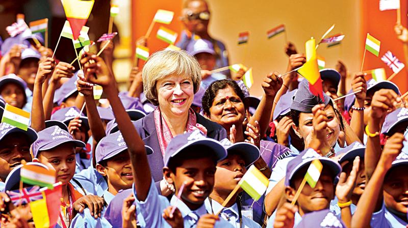 British Prime Minister Theresa May with students of Stonehill International school in Bengaluru on Tuesday (Photo: DC)