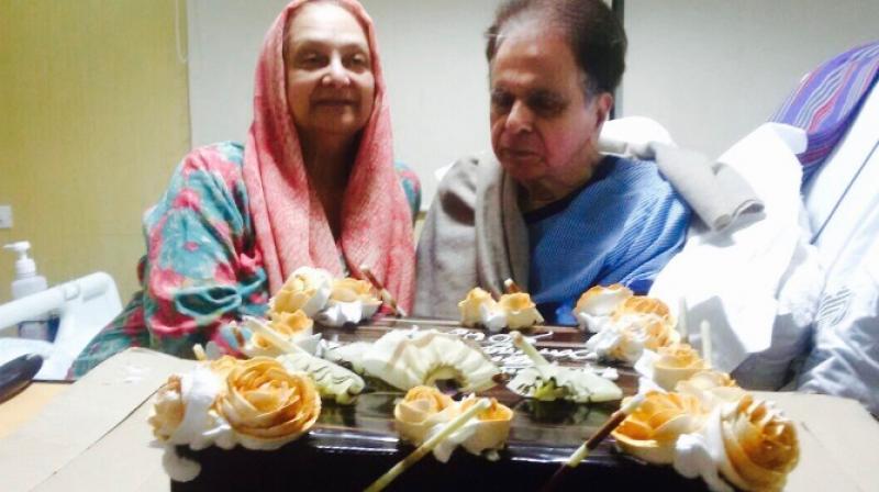 Dilip Kumar shared this picture, captioning it: \Saira, helps me cut a cake...\ (Pic courtesy: Twitter/ TheDilipKumar).