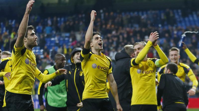 Dortmund also set a group-stage record with 21 goals as it stormed back from being 2-0 down. (Photo: AP)