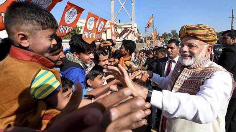 Polls suggest while it will be a BJP sweep in Himachal Pradesh, it will be a tight fight between the incumbent party and Opposition Congress in Gujarat. (Photo: PTI)