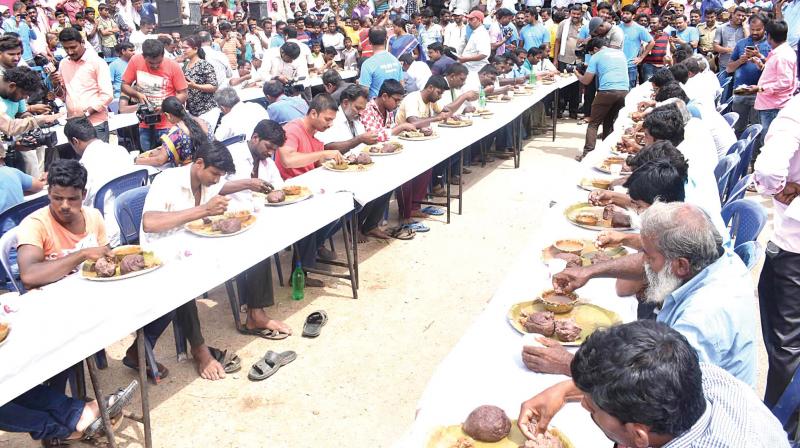 People take part in a ragi mudde eating contest in Mandya. (Photo:KPN)