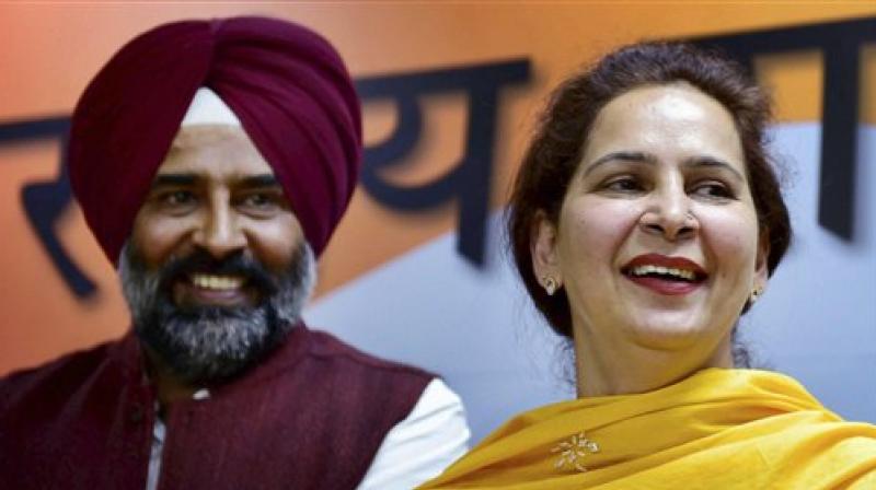 Former BJP MLA and wife of Navjot Singh Sidhu, Navjot Kaur Sidhu, along with former Olympian Pargat Singh. (Photo: PTI)