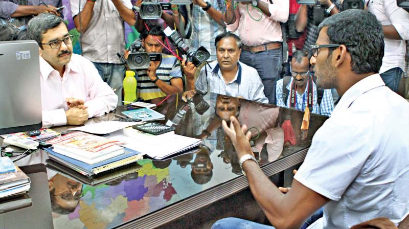 Actor Vishal, on Wednesday gives his petition to Chief Electoral Officer Rajesh Lakhoni at the secretariat, after his nomination papers were rejected (Photo: DC)