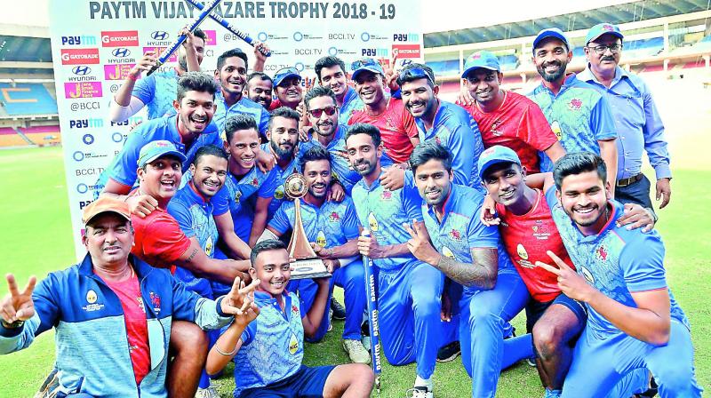 Mumbai celebrate after winning the Vijay Hazare Trophy  in Bengaluru on Saturday (Photo: AP)