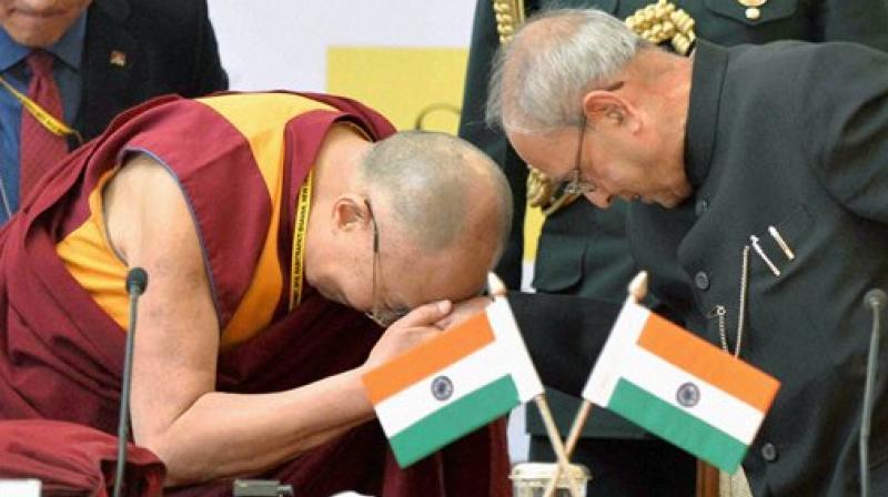 Dalai Lama (L) and President Pranab Mukherjee at the inaugural session of Laureates & Leaders Summit for Children. (Photo: AP)