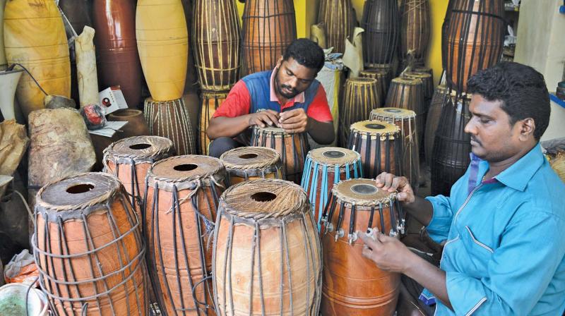 With music festival taking off, this shop in Mylapore gets busy with repairing and  tuning mridangams. (Photo: DC)
