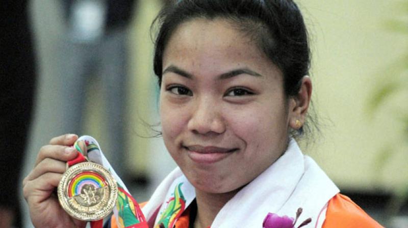 Mirabai Chanu lifted 85kg in snatch and 109kg in clean and jerk to total an impressive 194kg in the womens 48kg, in the process setting a new national record. (Photo: PTI)