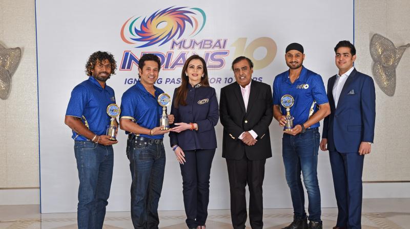 Nita and Mukesh Ambani felicitated cricket icon Sachin Tendulkar, Harbhajan Singh and Lasith Malinga for their invaluable contribution to Mumbai Indians. (Photo: Mumbai Indians)