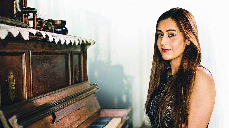 She was 12 when her music teacher spotted her talent and pushed her to pursue it.