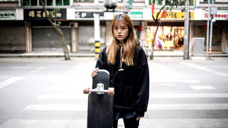 Mu says skateboarding and longboarding is not limited to gender, and many of her fans across the country are female. (Photo: AFP)