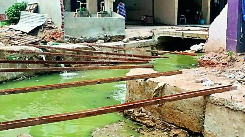 Sewerage widening works at Deepti Sri Nagar. The nala passes through apartments.