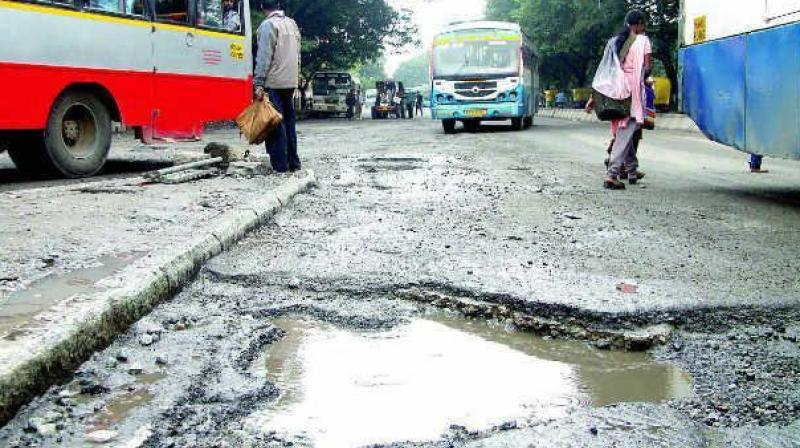 Motorists have to make their way on the uneven crater dotted and potholes filled road where driving is a back breaking exercise.