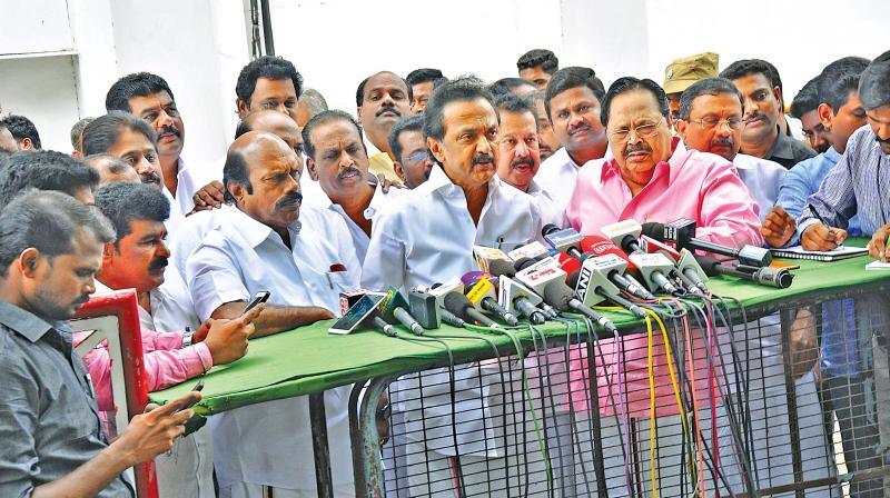 M.K Stalin along with party members addresses the media outside the Assembly. (Photo:DC)