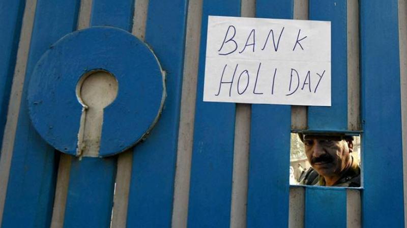 A State Bank of India, SBI, branch displays a sign of bank holiday outside the bank. (Photo: Representational/PTI)