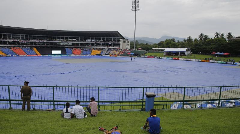 Englands first three one-day internationals in Sri Lanka have been affected by rain with the first match in Dambulla abandoned, while the tourists won the second game by 31 runs on the Duckworth-Lewis-Stern method. (Photo: AP)