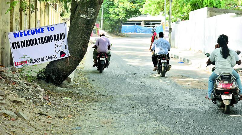 A total of six banners that read KTR-Ivanka Trump road, with a caution Please Be Careful, were put up on the 40-feet road besides St Johns Junior College on Tuesday.  (Image: DC)