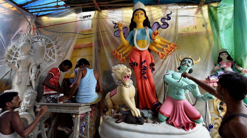 Assam committee known to commission experts for innovative marquees and idols, had assigned Guwahati-based Ahmed to make the  worlds tallest Durga idol . (Photo: Representational image/ PTI)