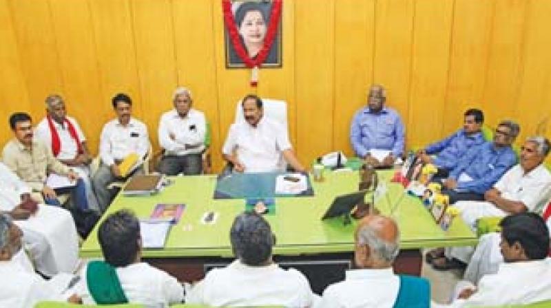 Electricity Minister P. Thangamani holding talks with the farmers in Chennai on Friday. (Image DC)