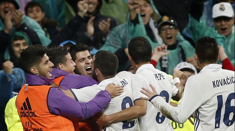 Marco Asensio and Alvaro Morata each struck twice in a one-sided match, the latter should have had at least a hat-trick as Real ran riot. (Photo: AP)