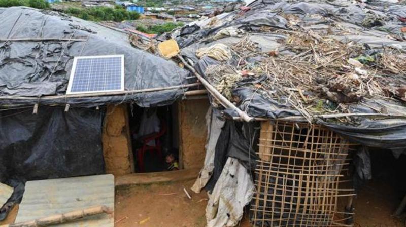 A solar panel on the roof of a temporary home for Rohingya refugees at the Kutupalong refugee camp in Coxs Bazar. ( Photo: AFP)