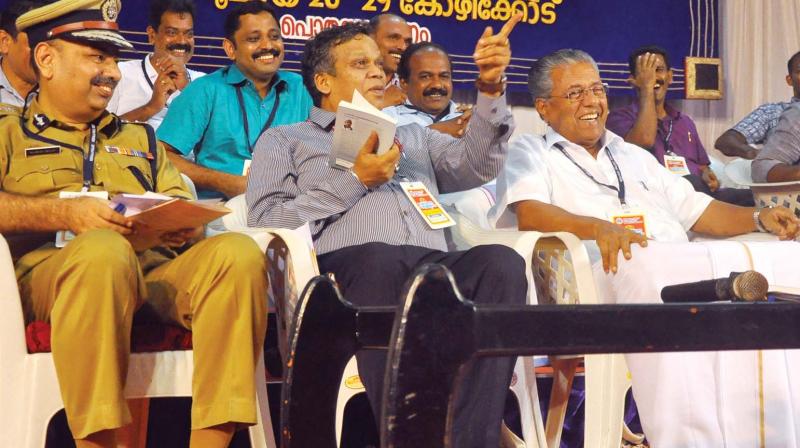 Chief minister Pinarayi Vijayan, DGP Loknath Behera and North zone DGP Rajesh Dewan at the valedictory function of the Kerala Police Officers Association state conference in Kozhikode on Saturday. (Photo: DC)