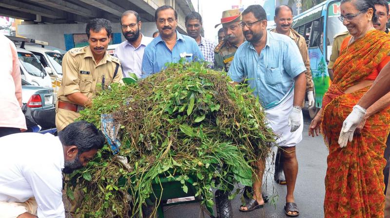 Mayor Thottathil Raveendran, district collector U V Jose among other officials during the special cleaning drive of the Corporation at Arayidathupalam in City on Saturday. (Photo: Viswajith K.)